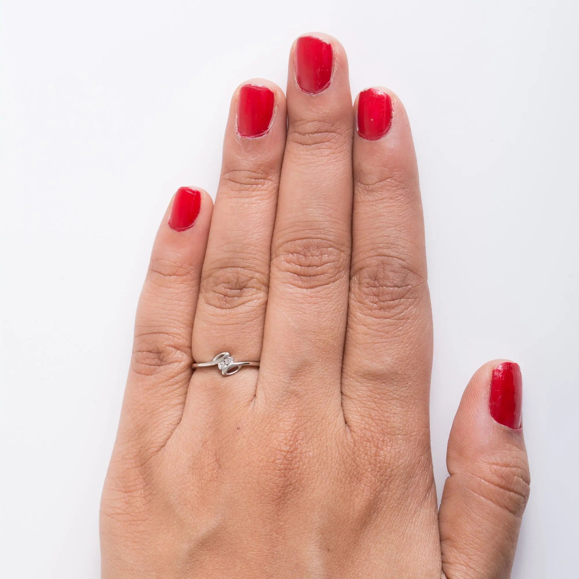 Finger View of SJ PTO 301 - 2 Diamond Platinum Ring for Women. This photo shows how the actual ring looks when worn by a woman.