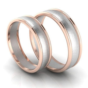 Perspective View of Classic Plain Platinum Couple Rings With a Rose Gold Border JL PT 633