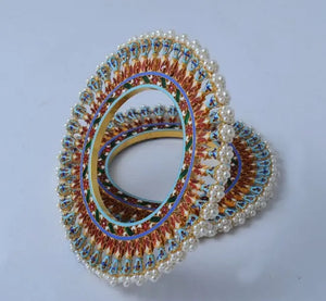 Famous Pearl Bangdi Bangle Pair by Suranas Jewelove in India